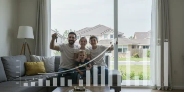 Family happily receiving house keys with an optimized credit score